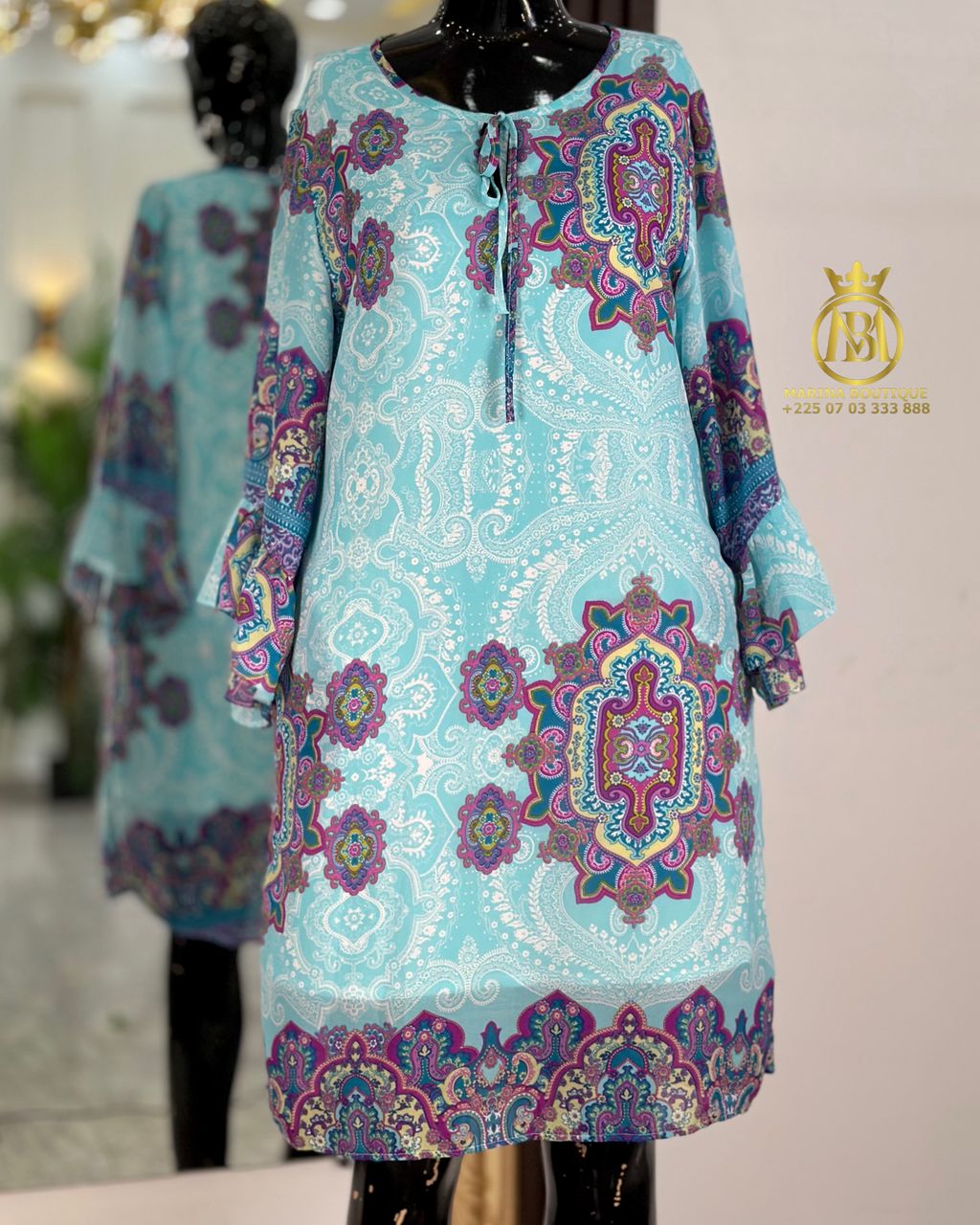ROBE AUX GENOUX