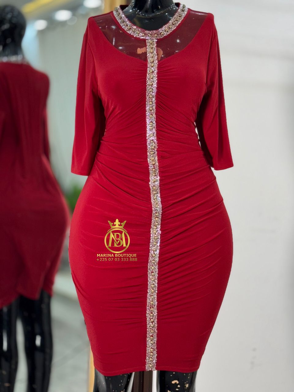 ROBE AUX GENOUX